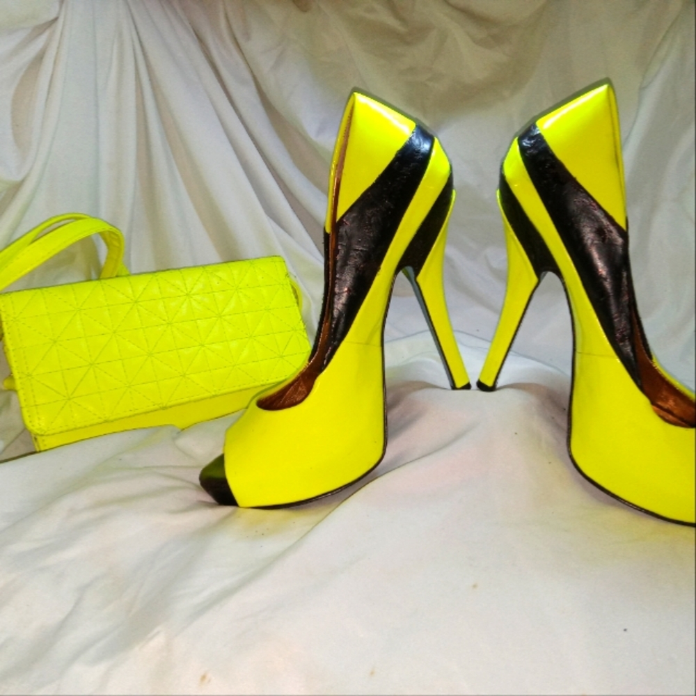 Bright yellow and black heels with matching clutch